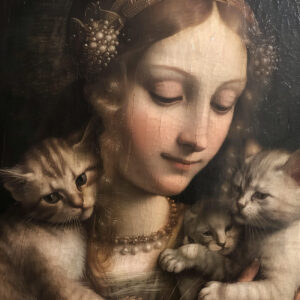 A closeup of a noblewoman with kittens.